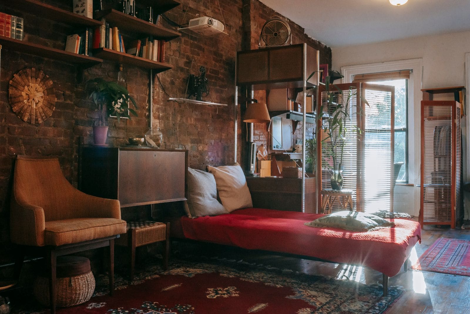 Classic bedroom with wooden furniture and antique patterned carpets