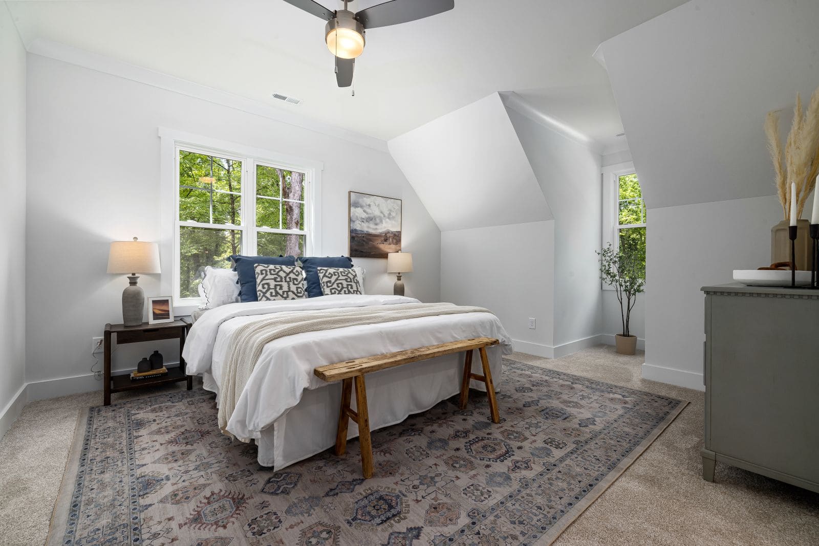 Bright modern hotel room in soft neutral tones