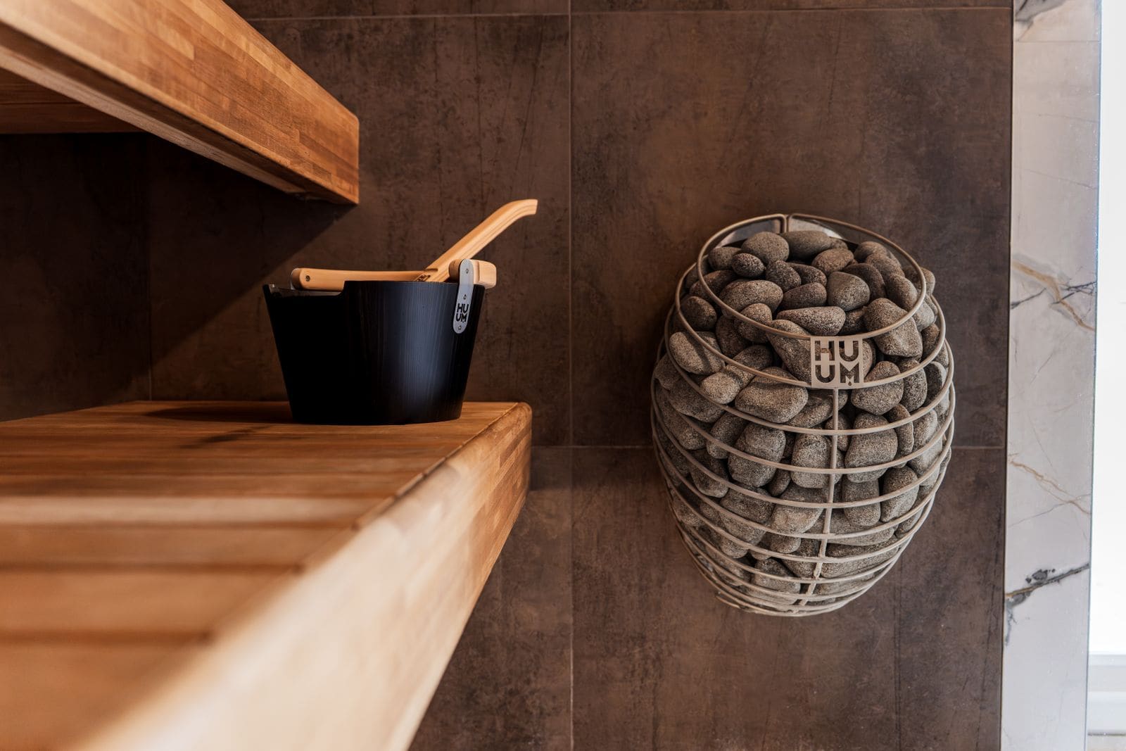 Modern Nordic sauna interior with wooden benches