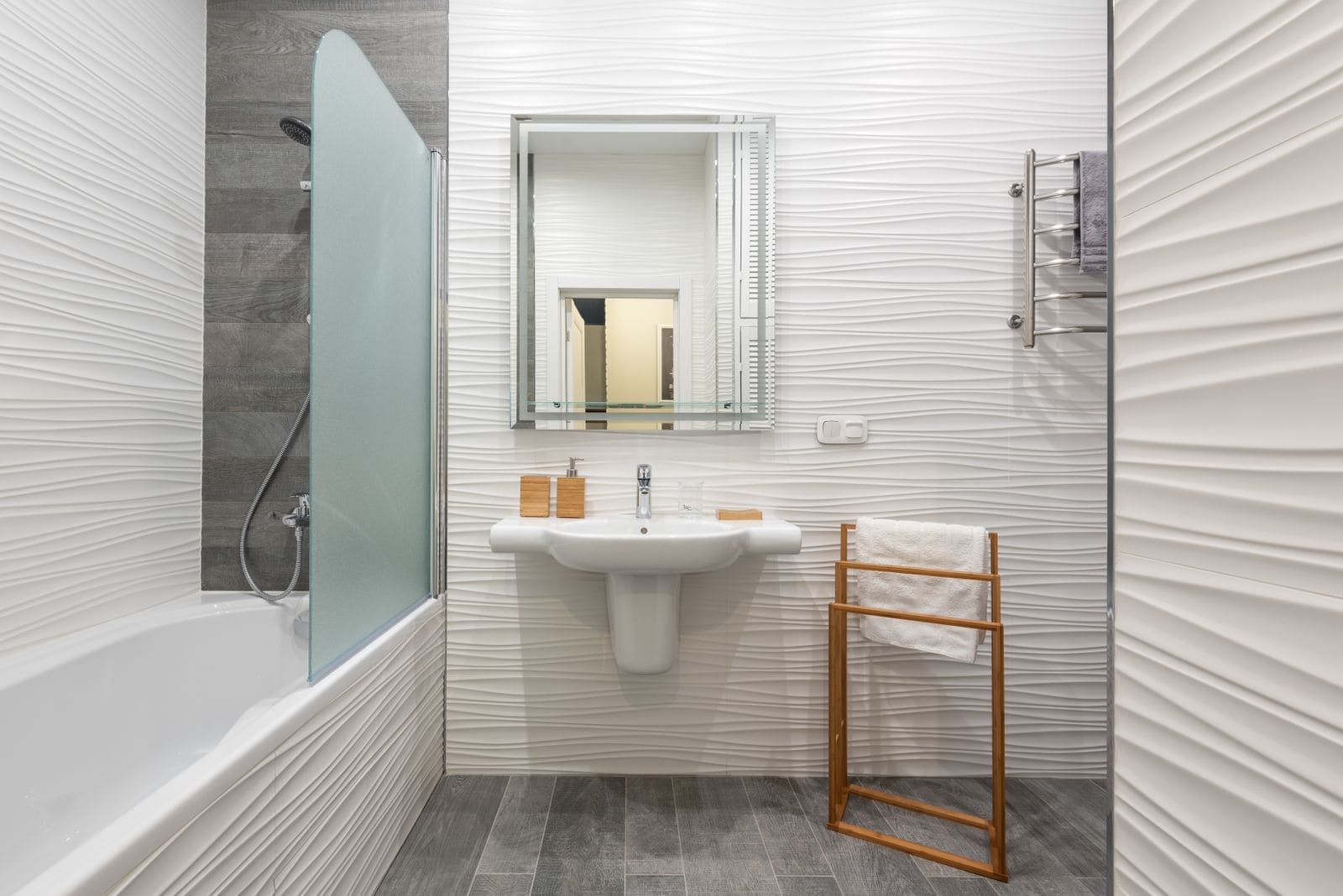 Modern bathroom with a bath and a washbasin