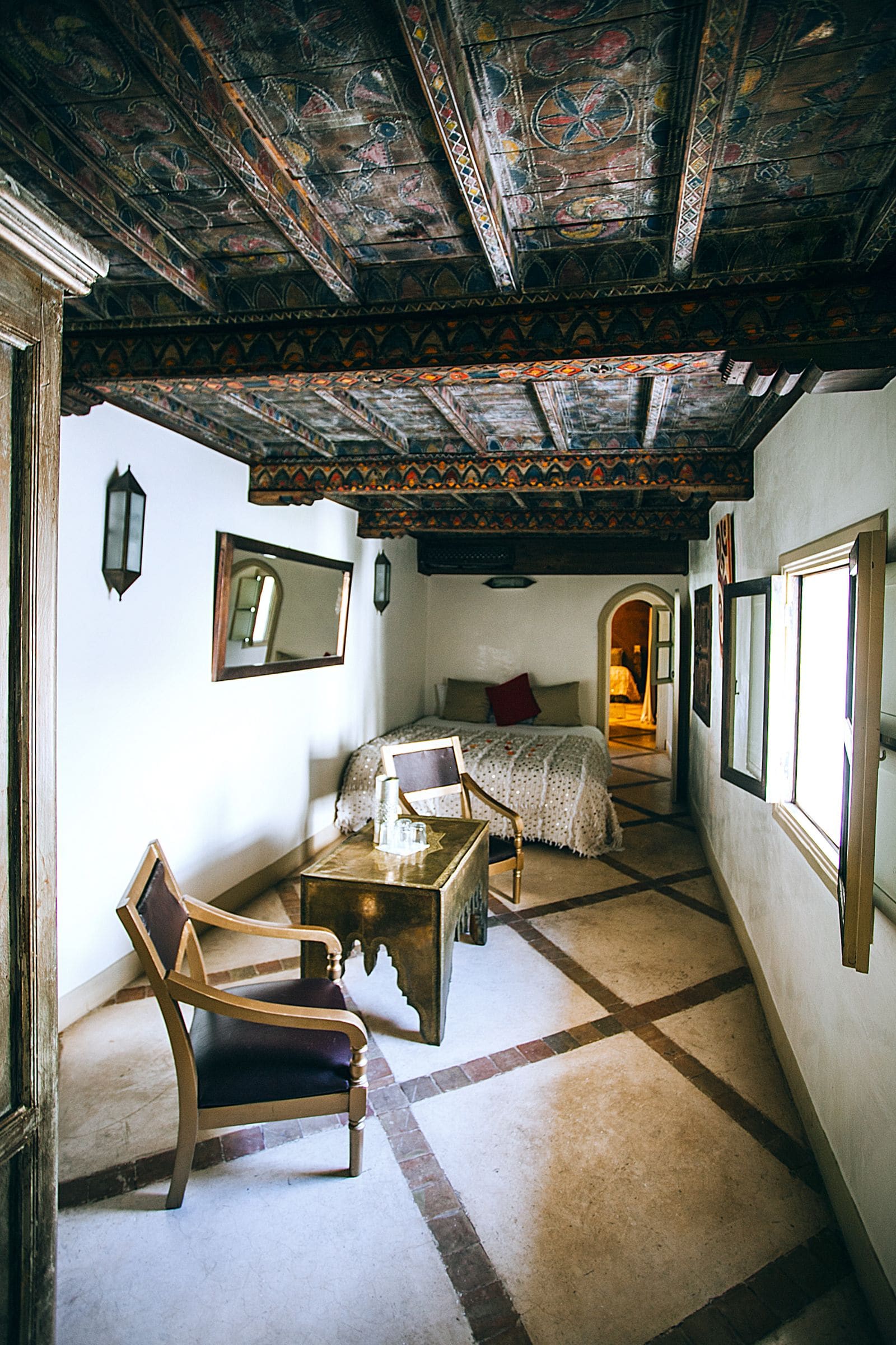 Cozy bedroom with a wooden ceiling